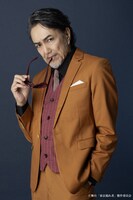 石坂勇扮する大塚正人。