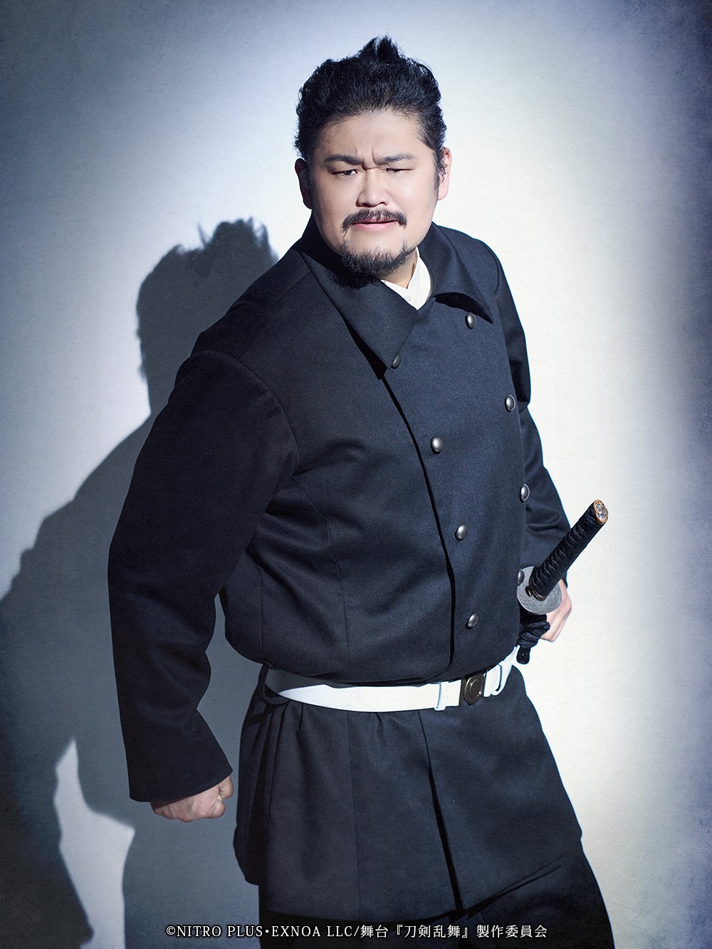 阿見201扮する谷三十郎。