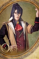 丘山晴己扮するオズ。