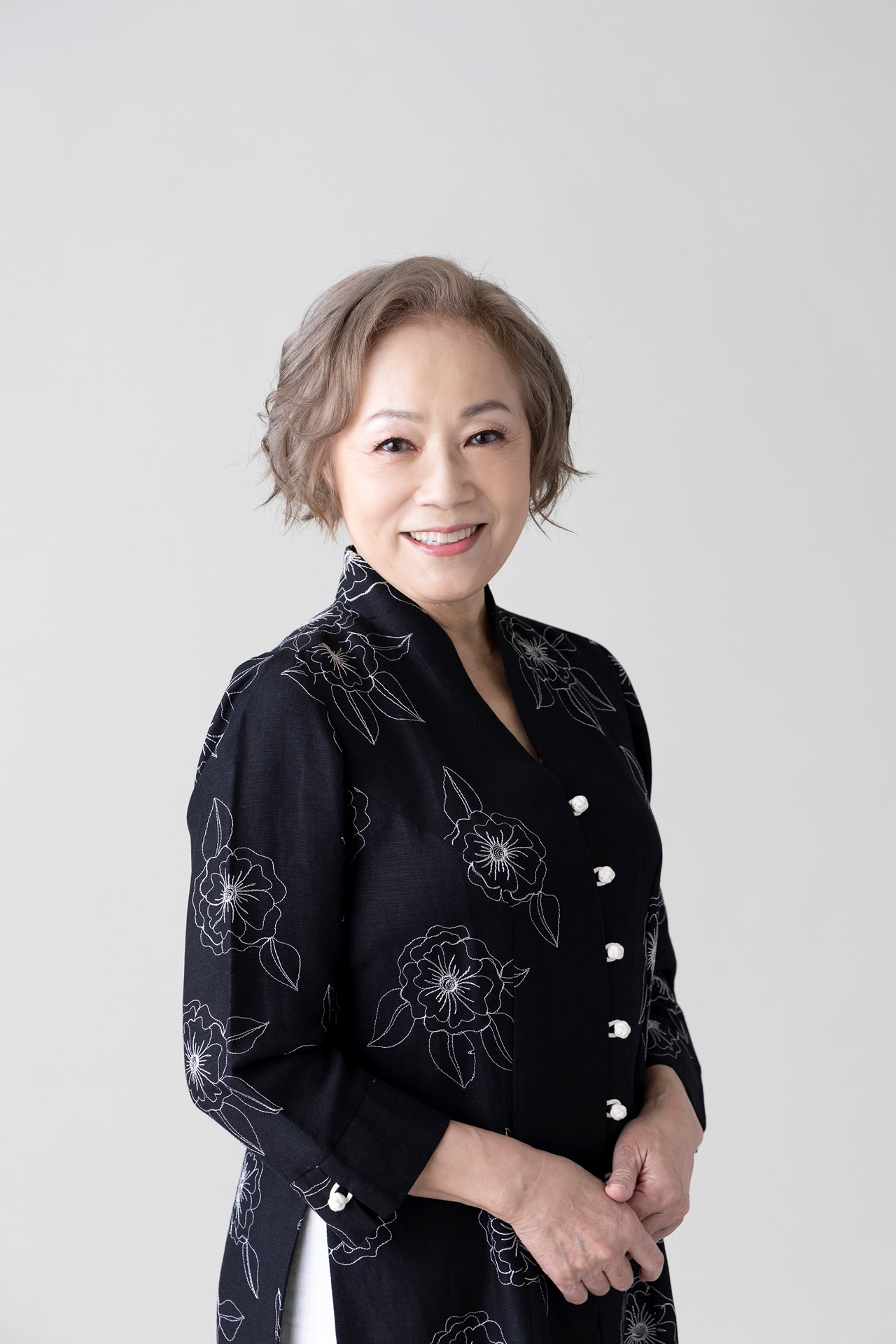 増子倭文江