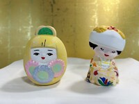 左が嫁吉作成の“米吉姫だるま”。愛を感じる可愛さ。