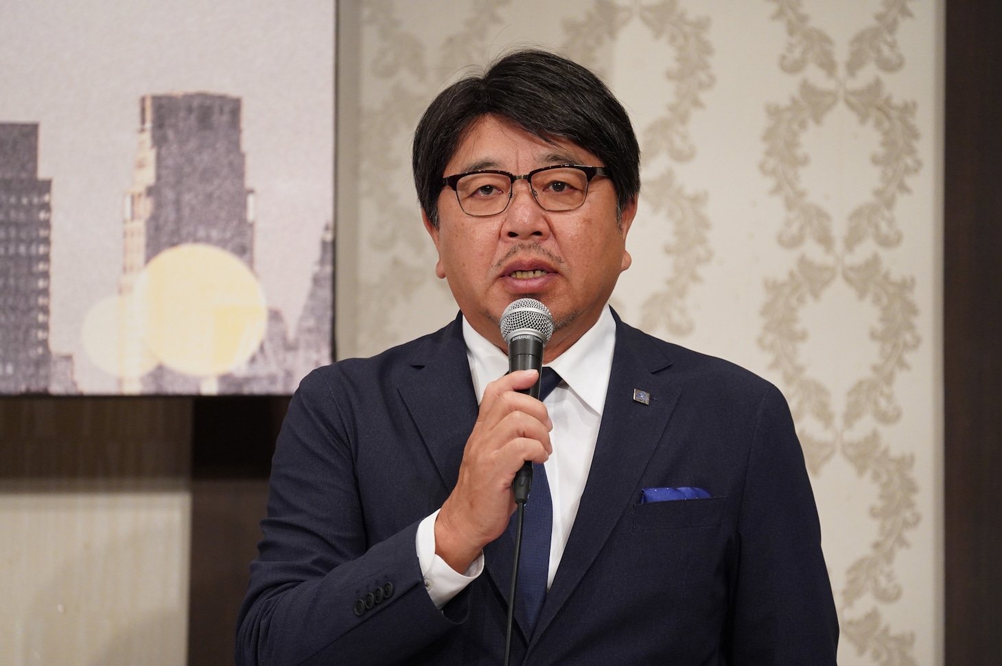キューブの北牧裕幸代表取締役社長。