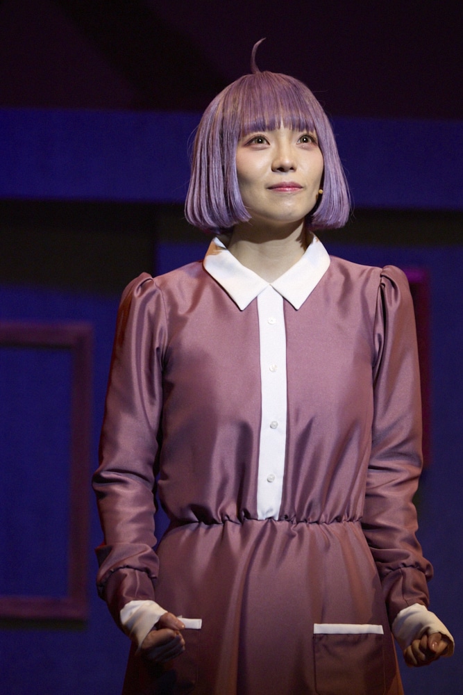 生田輝演じる塚原音子。
