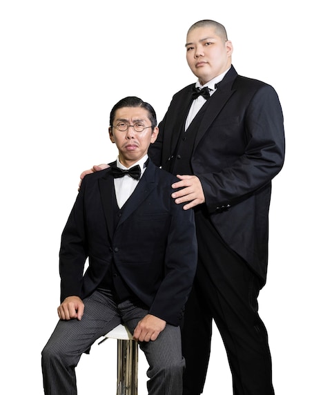 ボブ・マーサム（左）と満腹満。