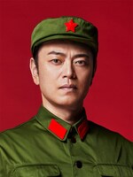 袁力本役の飯田洋輔のビジュアル。