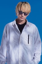 村田充扮する田中。