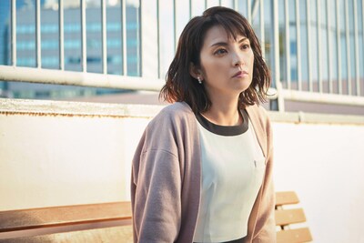 田中麗奈演じる望月かおり。