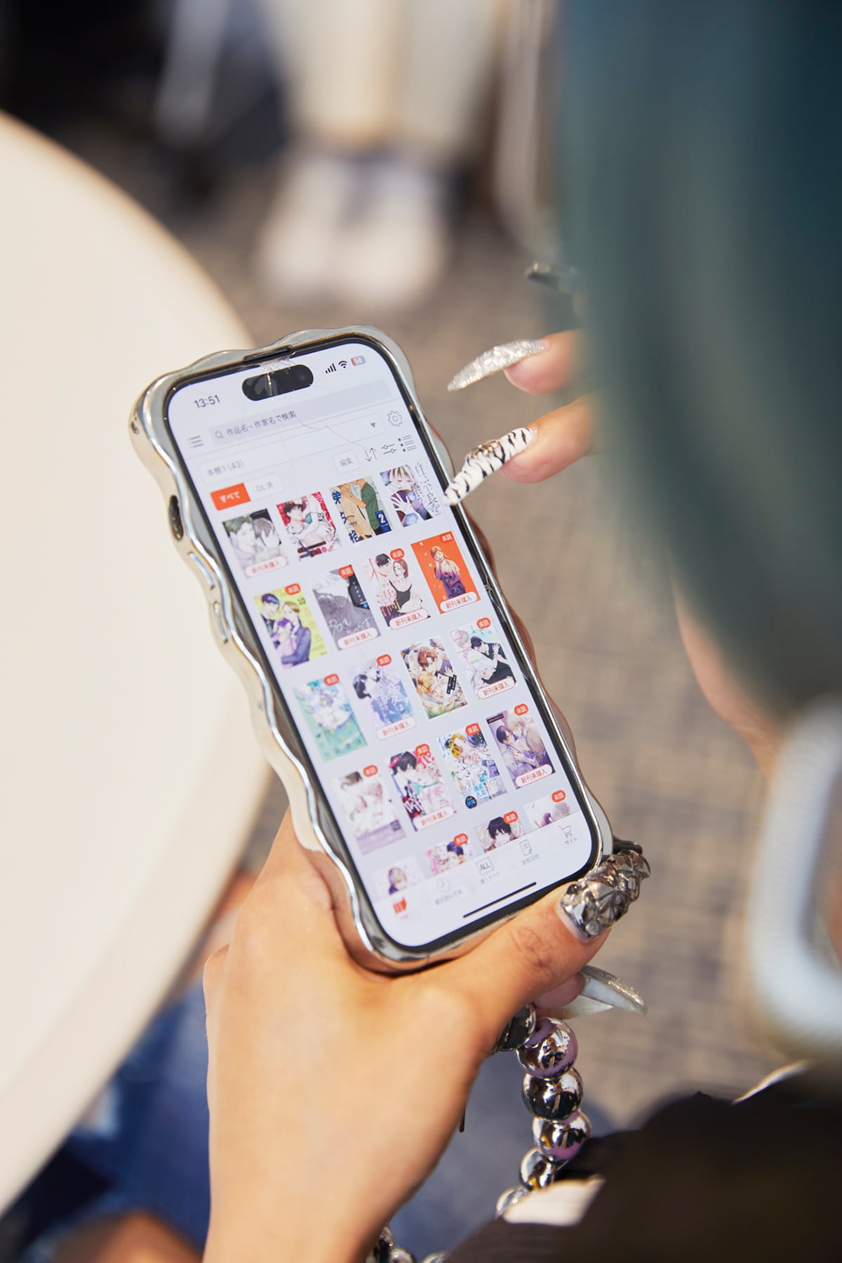 信子が実際に使っているコミックシーモアの「本棚」。