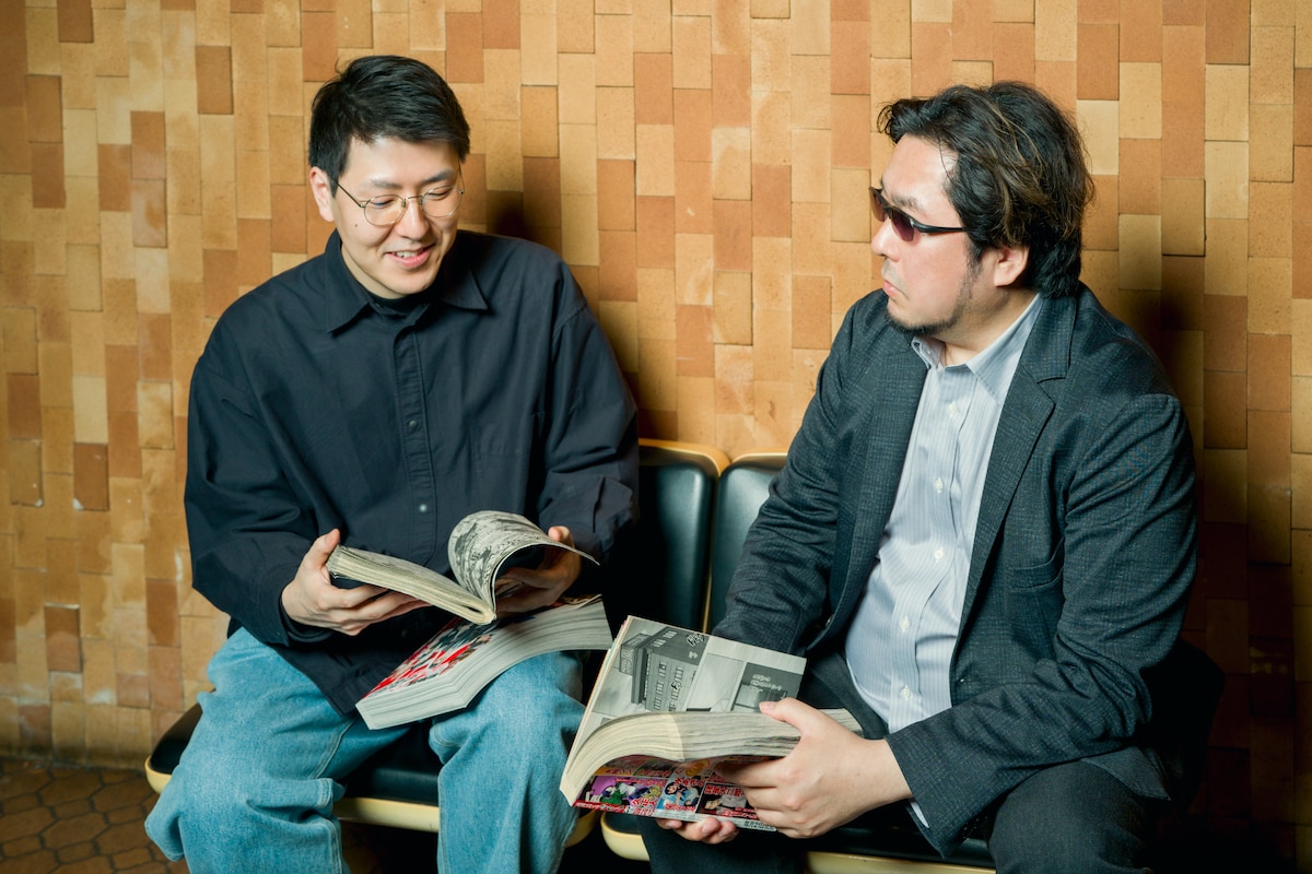 左から西川有正編集長、井上淳哉。