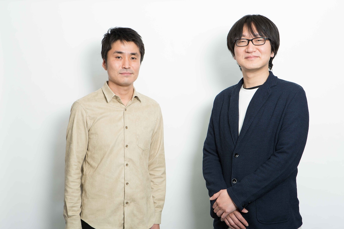 左から編集長、チーフデスク。