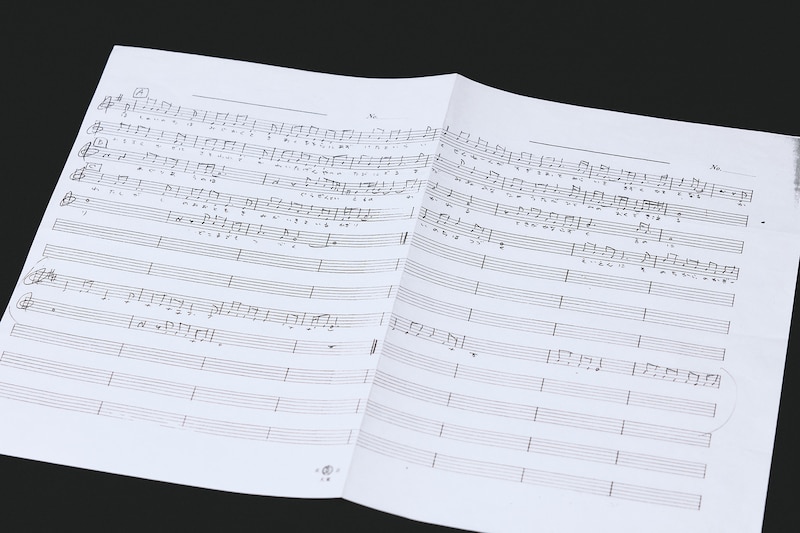 植松伸夫直筆の「Melodies Of Life」歌詞入り譜面。