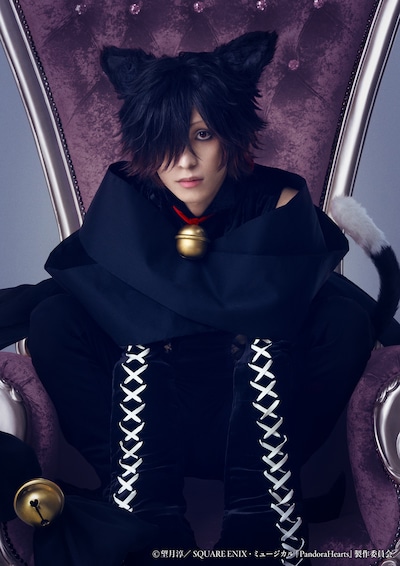 田口司扮するチェシャ猫。