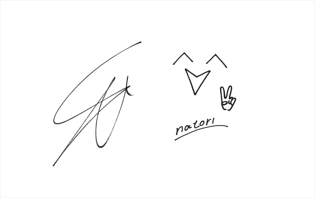 対談後にスケッチブックに2人で書き残したサイン。