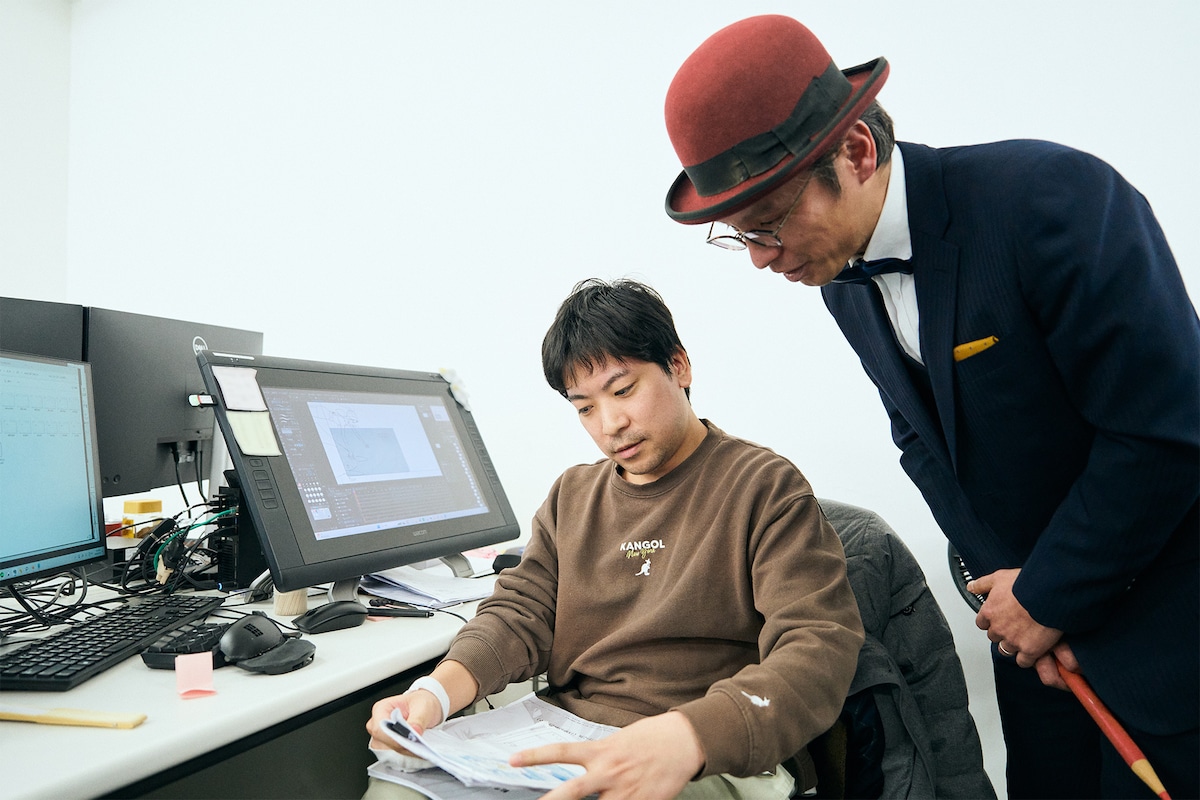 左から持田真治氏、赤ペン瀧川。