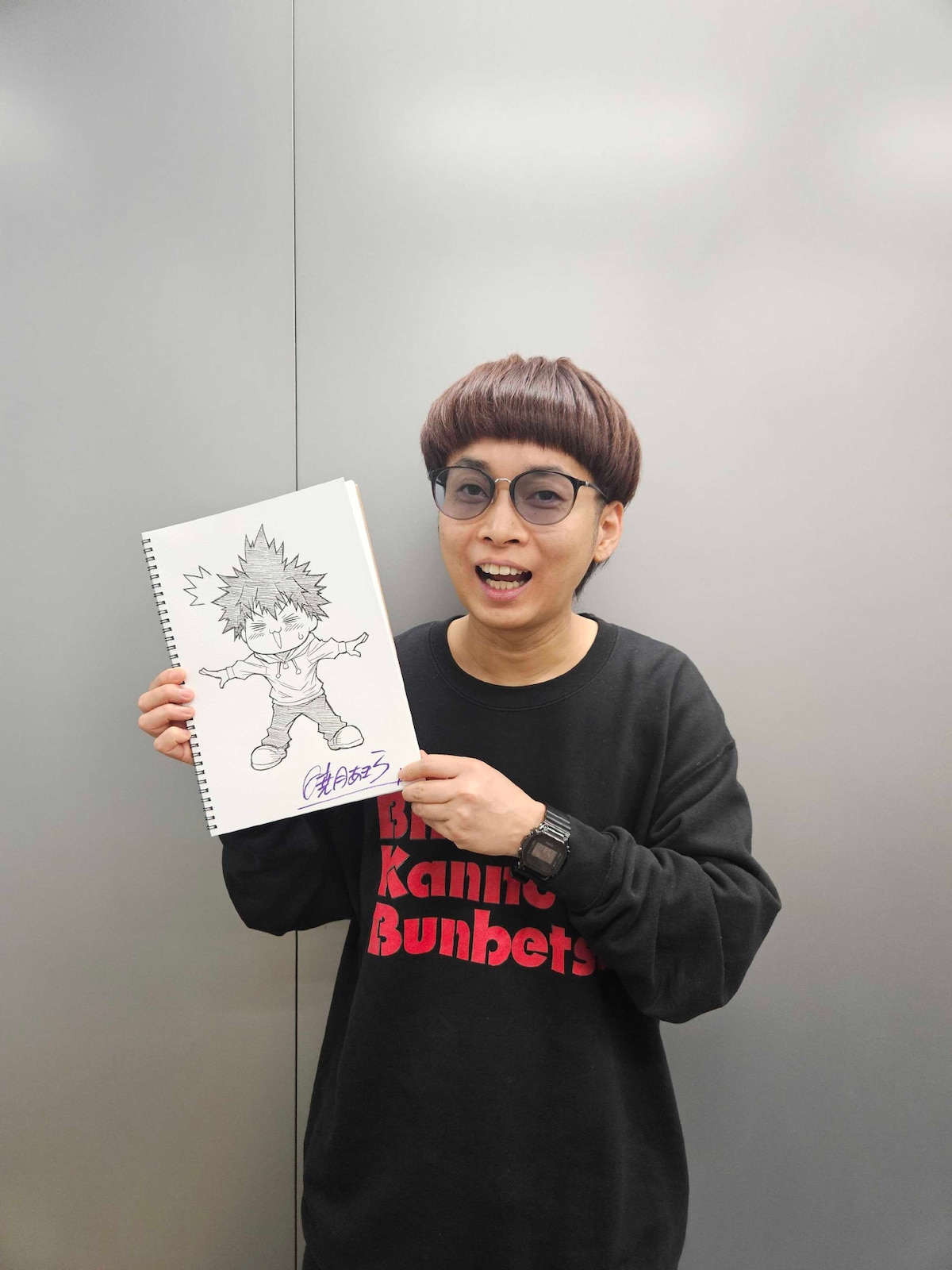 暁月あきらの自画像を持つBKB。